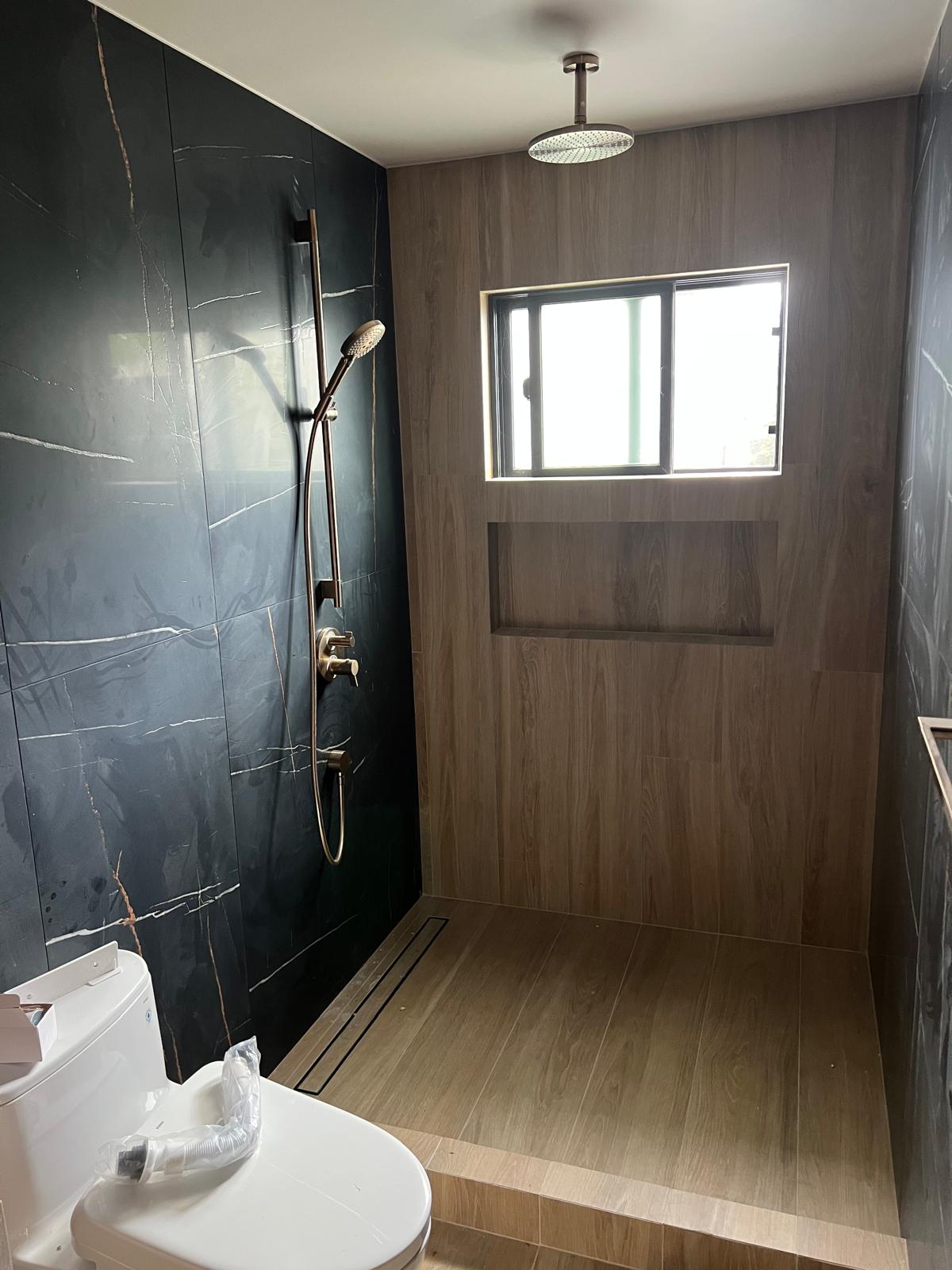 Contemporary bathroom with wood-look tile and modern fixtures