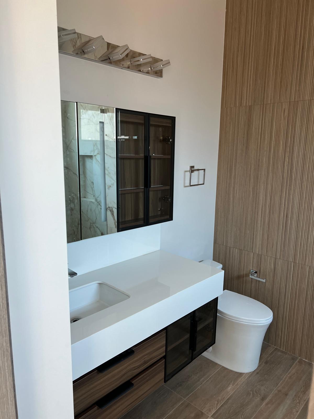 Luxury bathroom with marble walls and dual vanity